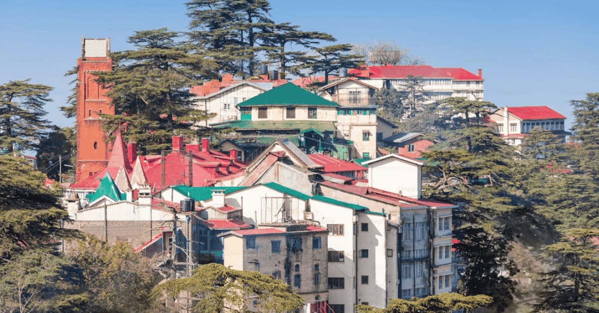 Shimla hill station town with colonial buildings and cedar trees – top hill stations to visit in India.